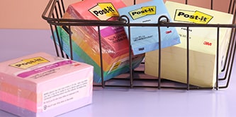 A basket filled with colorful Post-it&reg; Note pads, showcasing various pack sizes and formats
