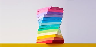 A stack of colourful Post-it&reg; Notes arranged in a tower, showcasing a variety of vibrant Post-it&reg; Note colours
