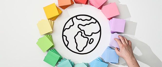 Colourful Post-it® Notes arranged in a circle around a drawing of Earth
